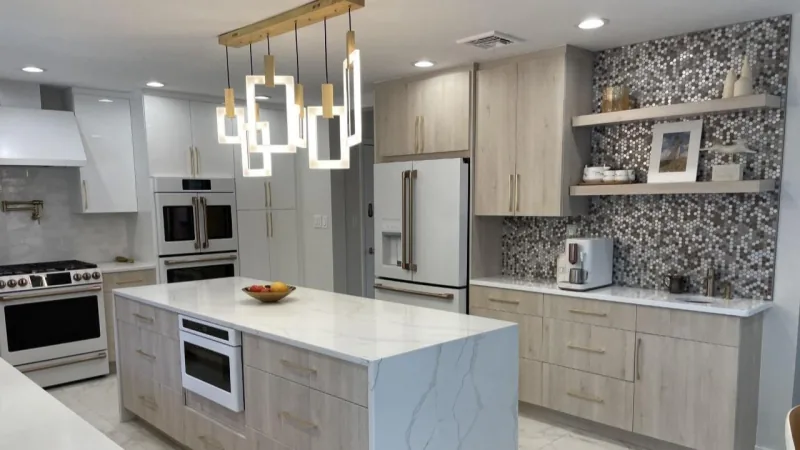 Light wood custom cabinetry with mosaic backsplash