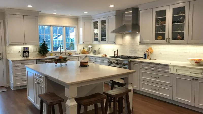 White shaker kitchen with marble island